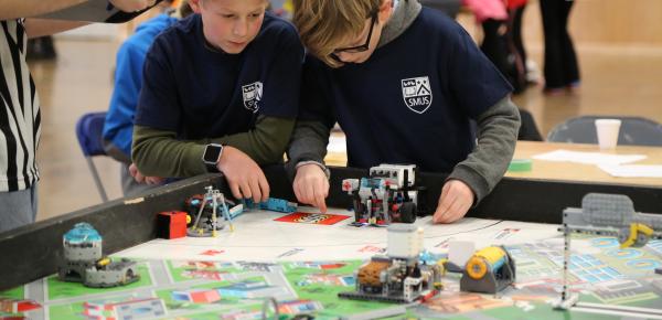 Middle School students competing at LEGO Robotics