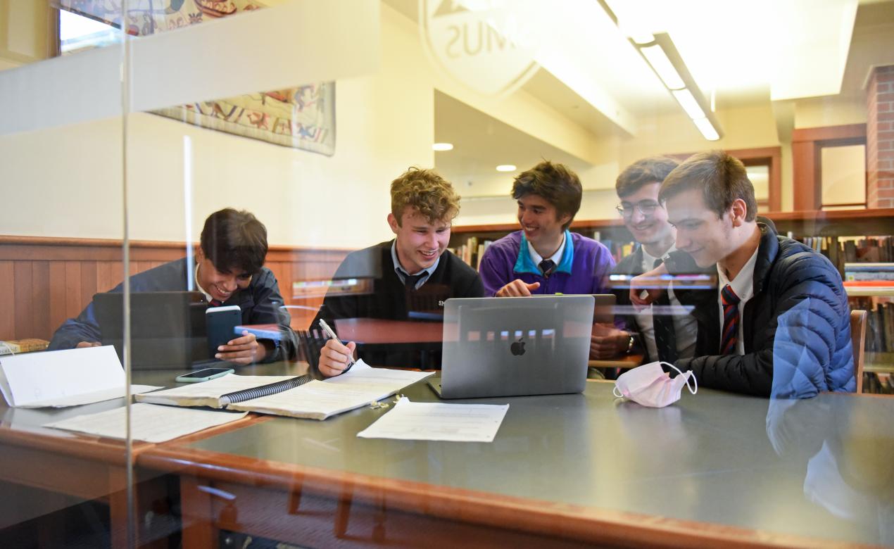 Students studying in the Snowden Library