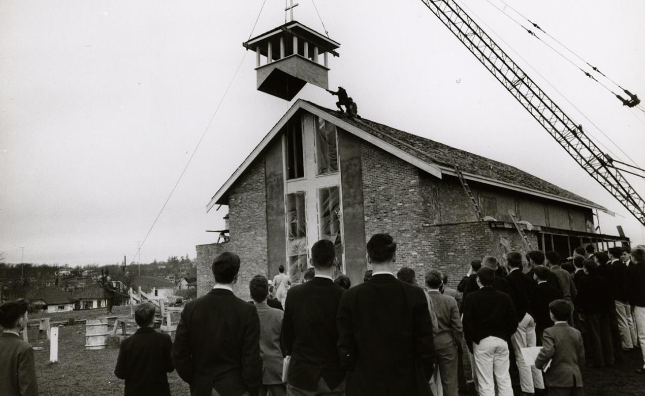 Archive photo of the bell tower being installed on the Chapel