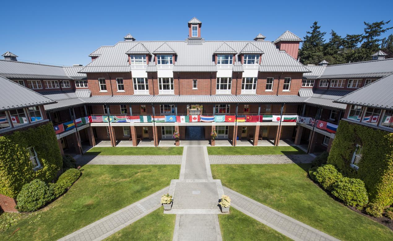 Country flags hanging from the railings on Crothall building