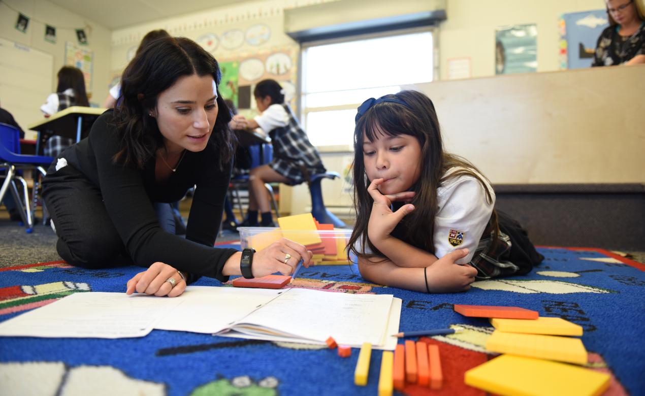 Junior School student and teacher in the classroom