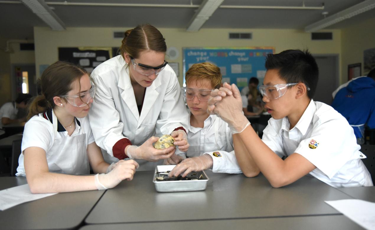 Middle School students and science teacher