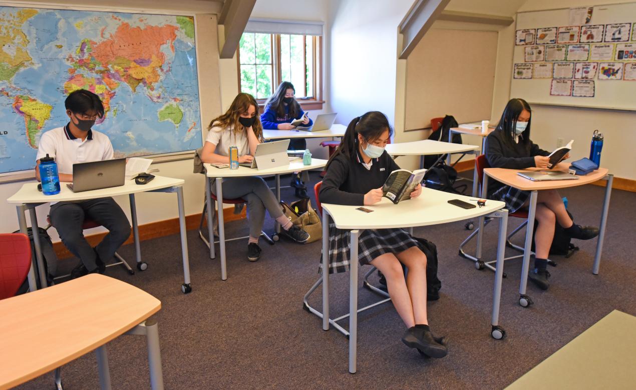 Senior School students read independently in the ELL classroom