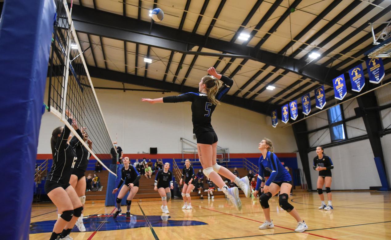 Senior Girls Volleyball game in the gym