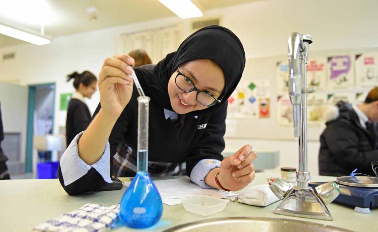 Senior School student conducting a science experiment in the lab