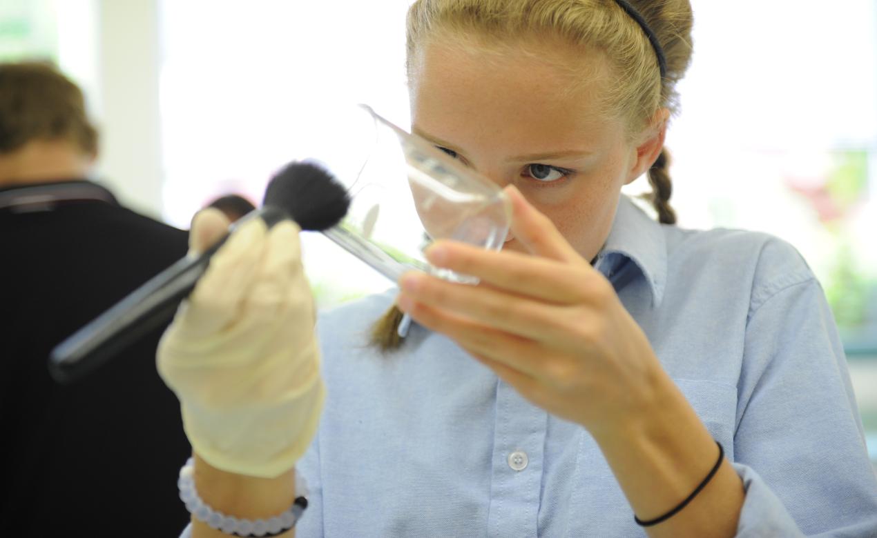 Senior School student conducting a science experiment in the lab