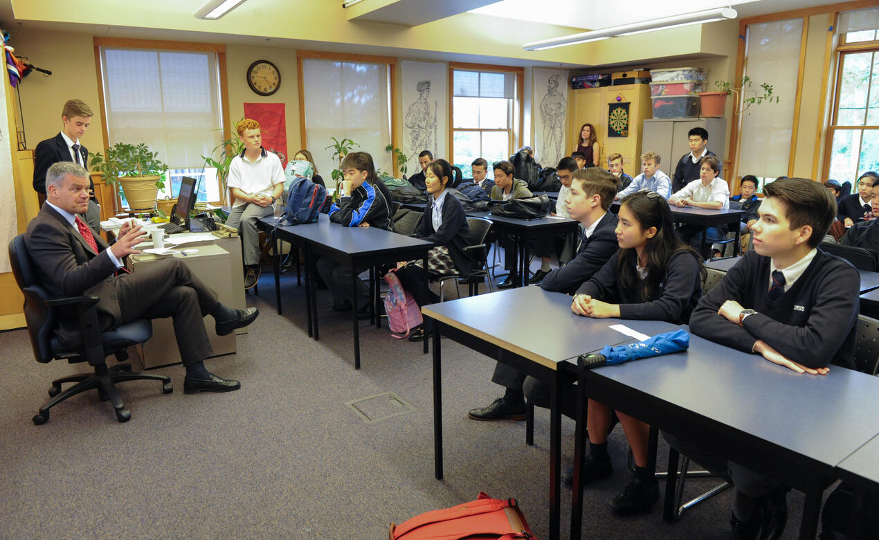 Mark Turner and the Academic Council have a classroom discussion