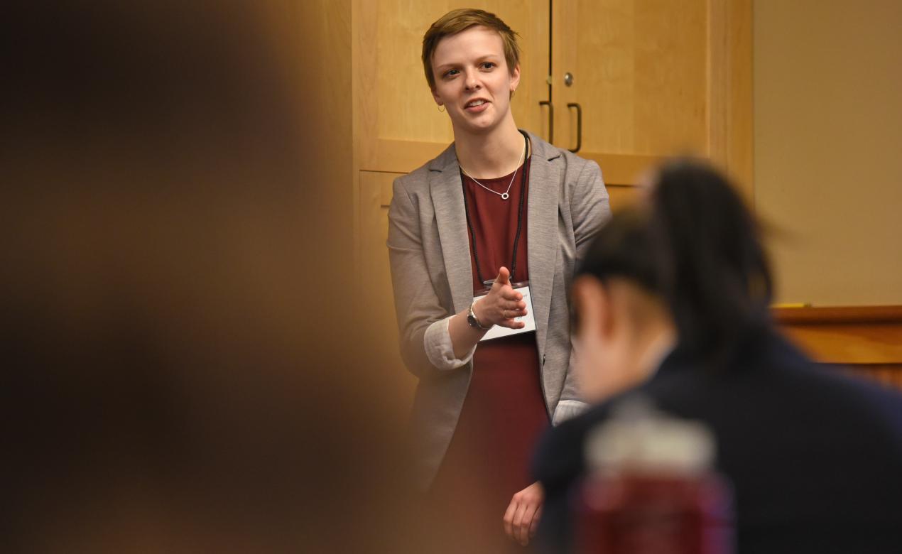 Alumna Kaylynn Purdy '10 stands at the front of a classroom speaking to Senior School students during Career Day in 2019.