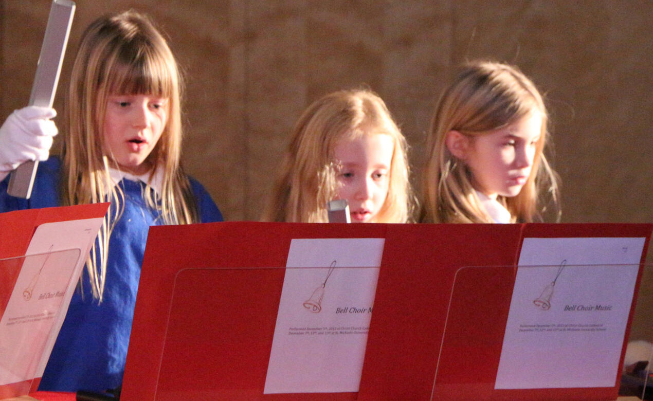 Grade 3 students perform in the bell choir at a Christmas concert