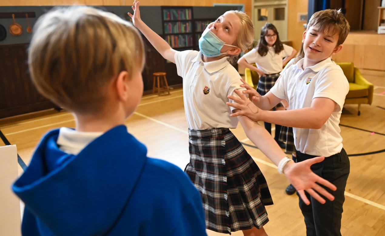 Grade 5 students rehearse Cinderella: A Family Pantomime
