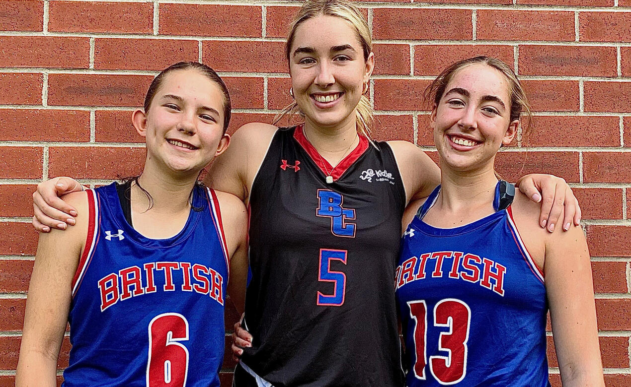 Athletes Avery, Makena and Charlie pose with their Team BC basketball jerseys