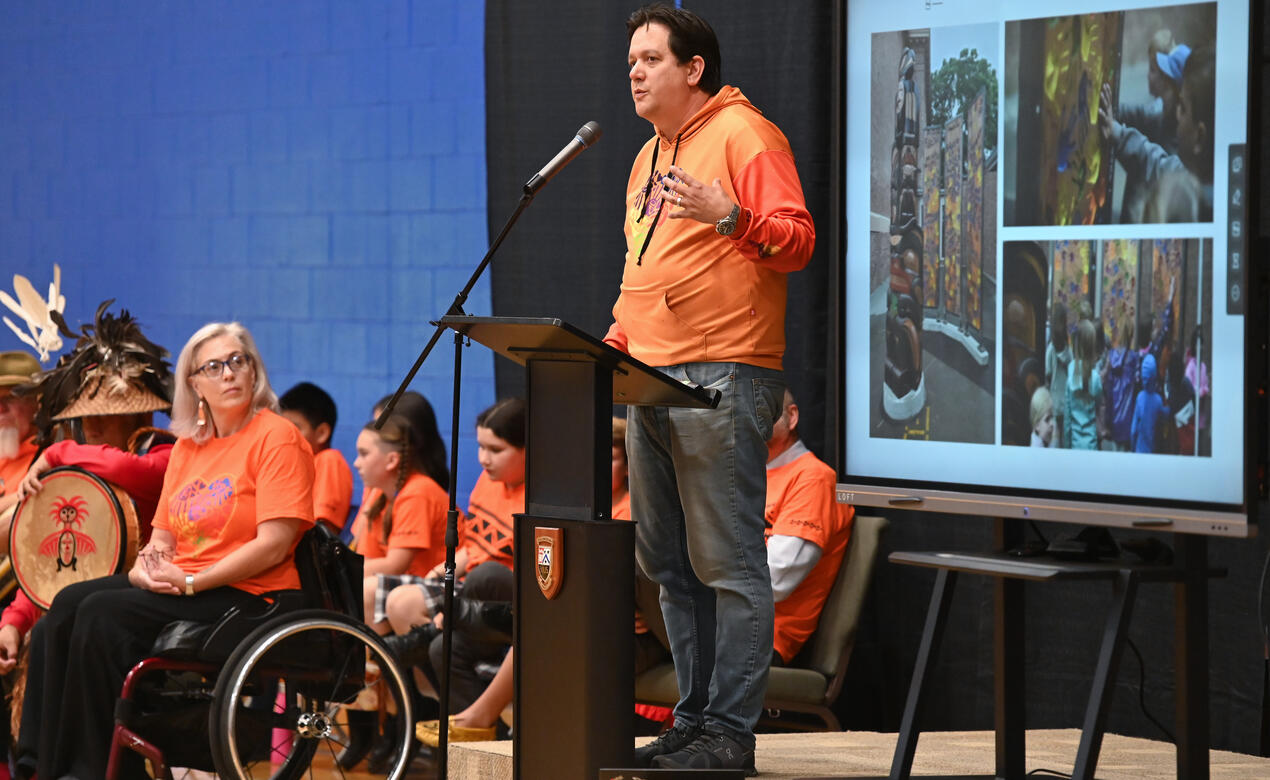 Artist Carey Newman speaks to the Senior School during the National Day for Truth and Reconciliation ceremony.