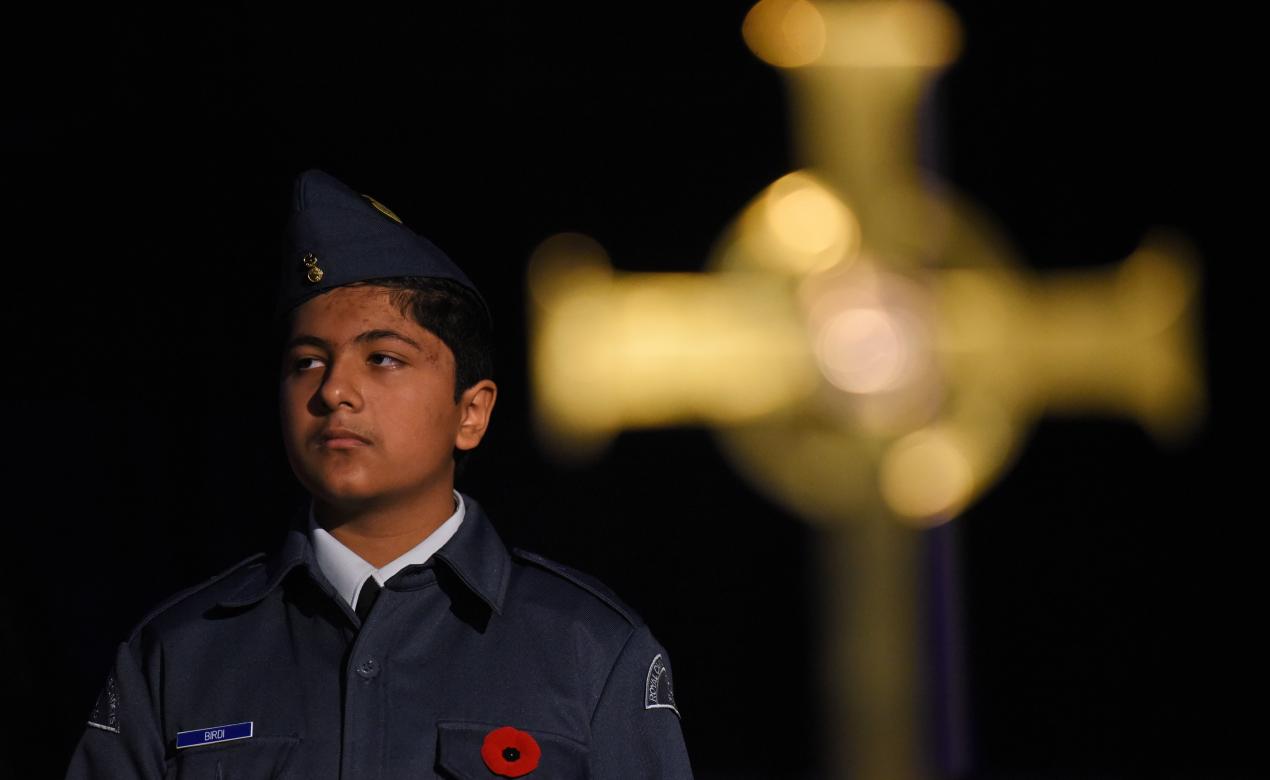 A Middle School student wears a uniform during the Remembrance Day Service.