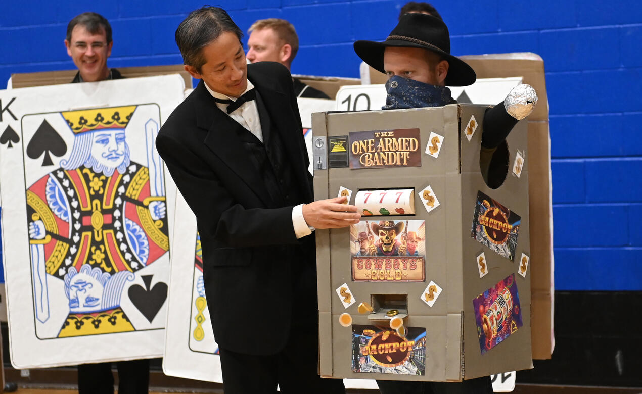 Senior School science teachers dressed as a gambler and a slot machine for Halloween
