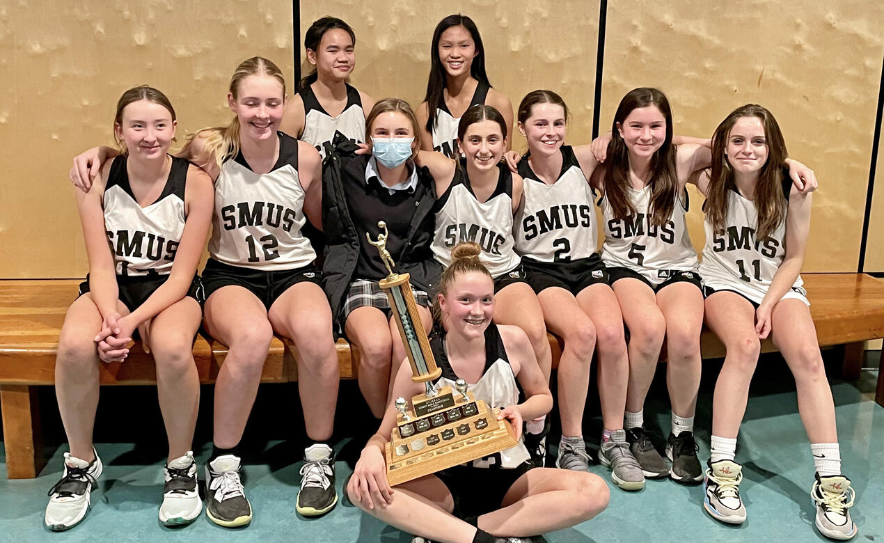 The Grade 8 Girls Basketball team after winning the City championships
