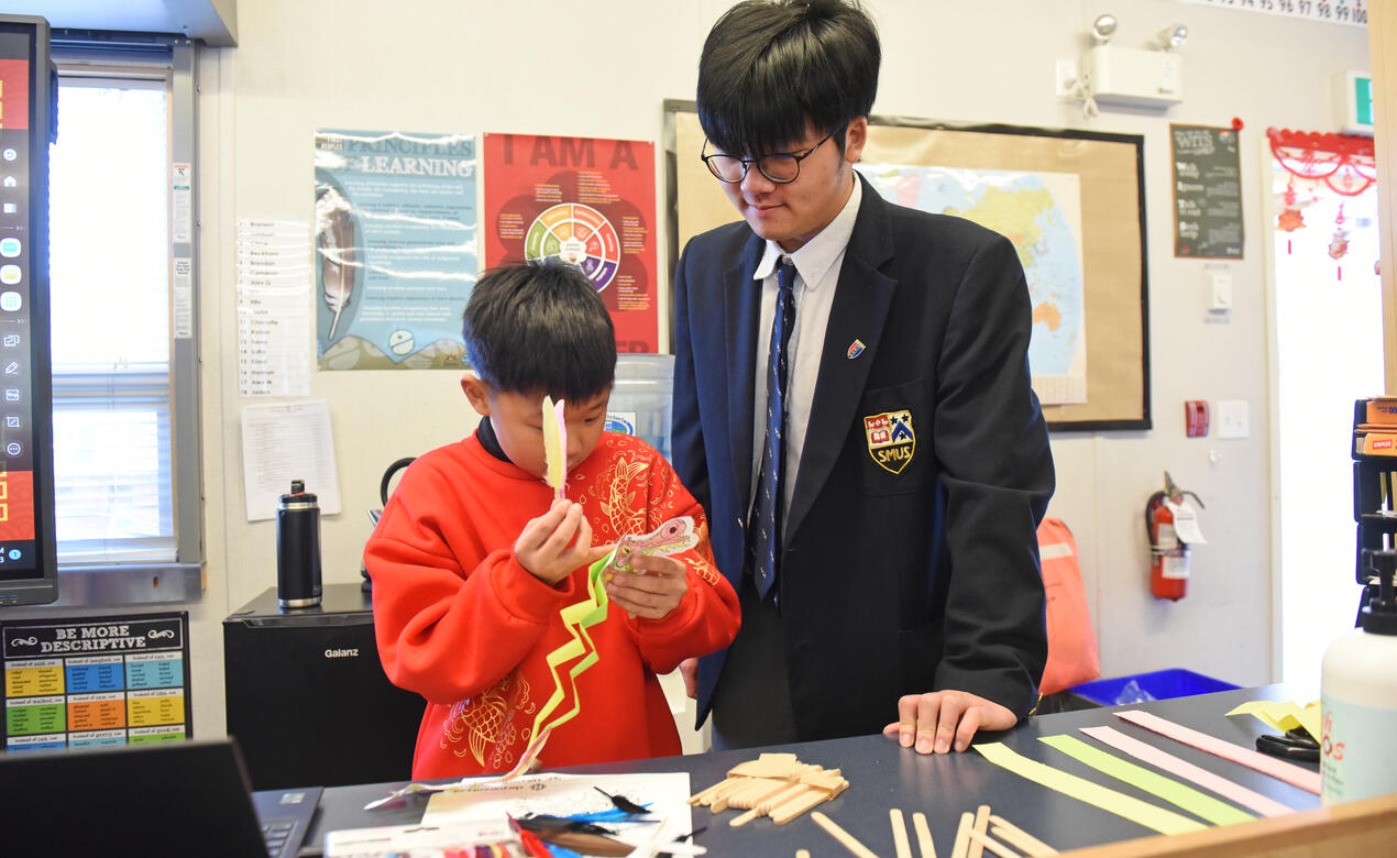 Junior and Senior School students work together while celebrating Lunar New Year.
