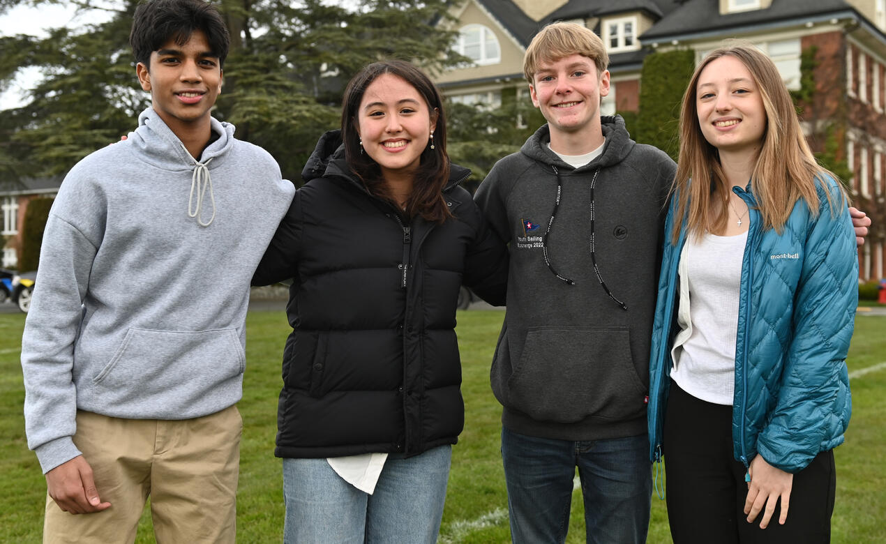 The finalists for the 2023 running of The Best School Year Ever pose for a photo in front of School House