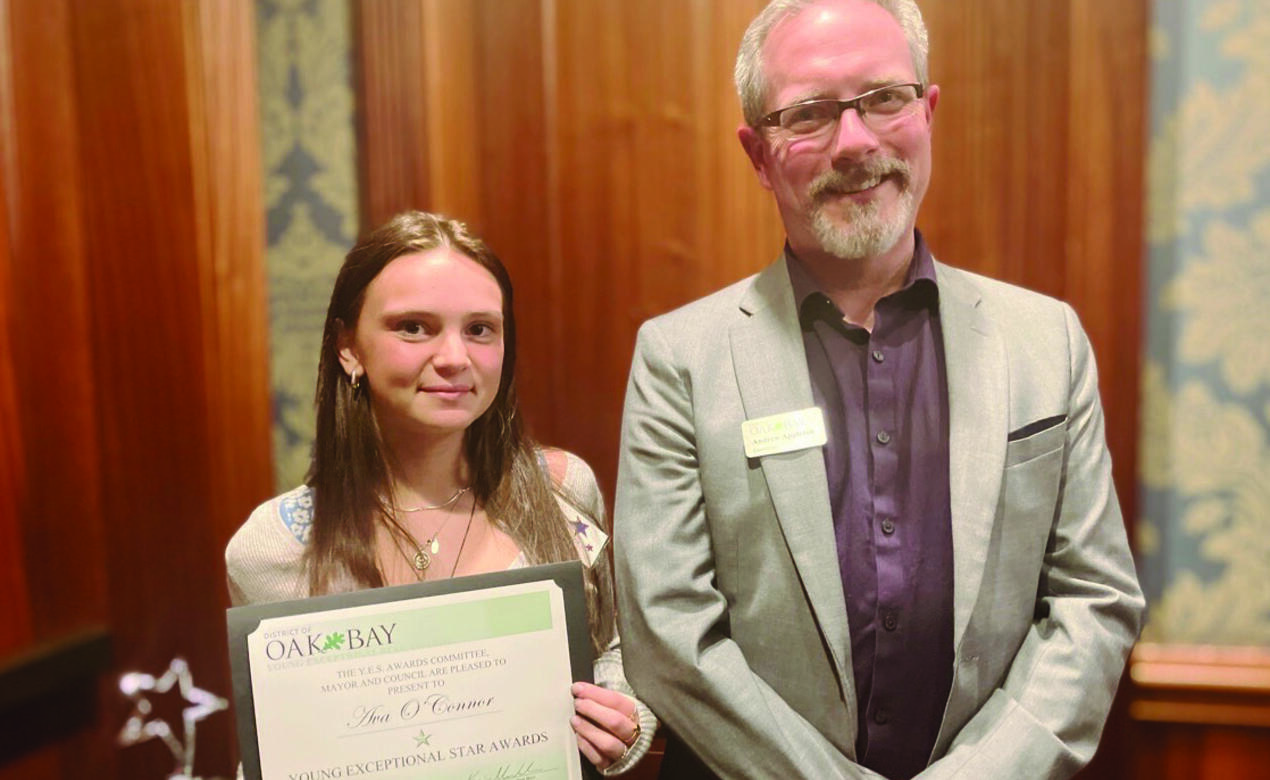 Grade 12 student Ava O'Connor with Oak Bay Councillor Andrew Appleton during the YES Awards ceremony