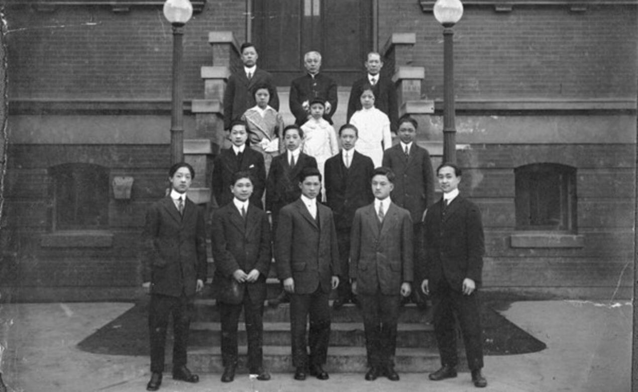 Students and staff stand in front of the Chinese Public School