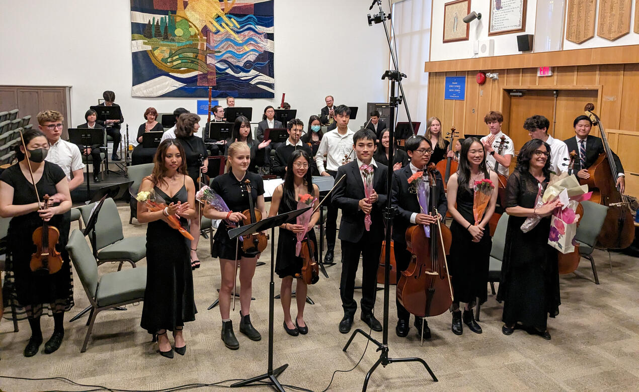 Students accepting applause after their performance