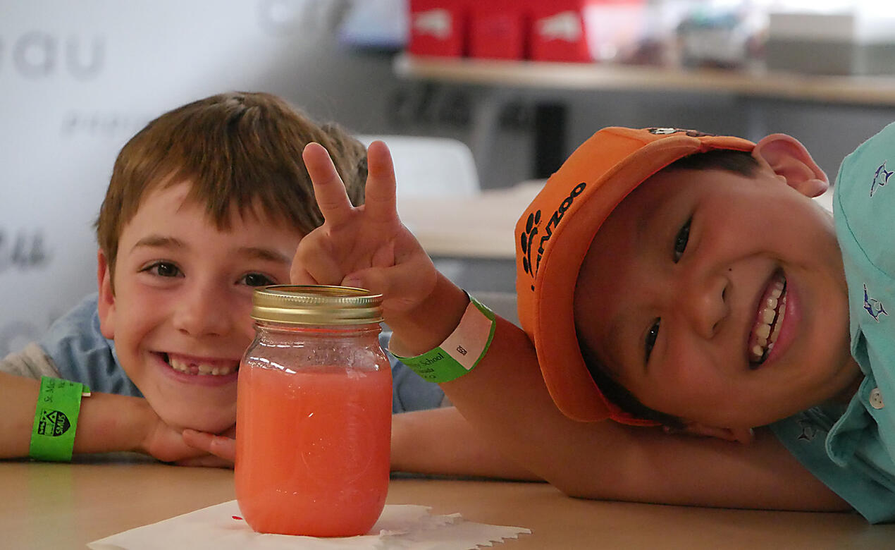 Students perform experiments during a Discovery Camp