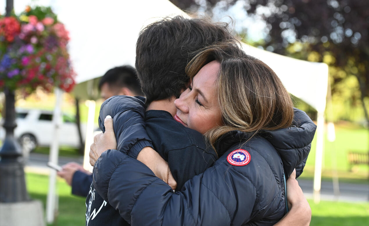 Parents say goodbye to their child at the new boarder orientation