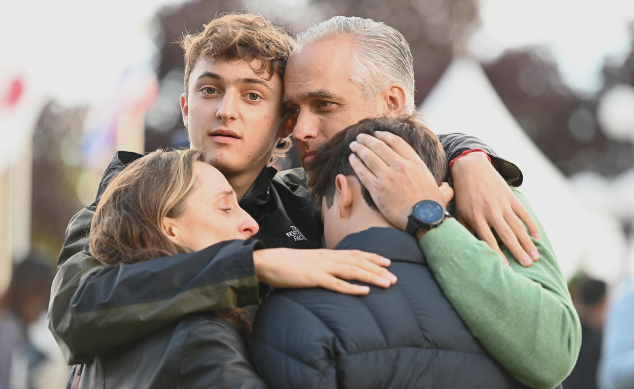 Parents say goodbye to their child at the new boarder orientation