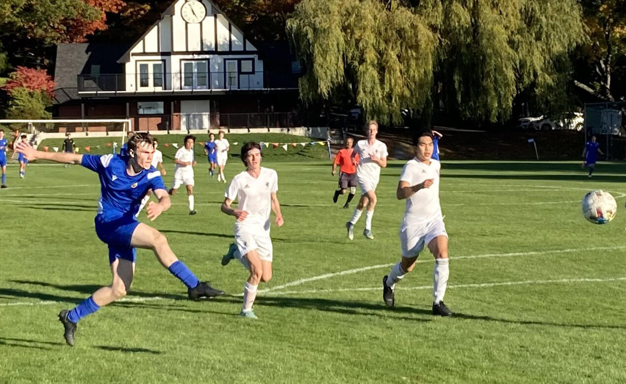 A SMUS player takes a shot at goal