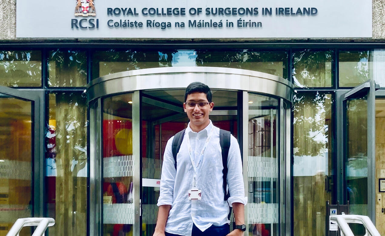 Nekhil stands in front of the main entrance to the Royal College of Surgeons in Ireland