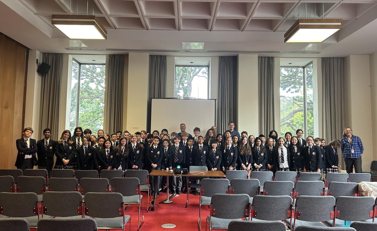 A group photo of Grade 6 at Victoria City Hall with counsellors.