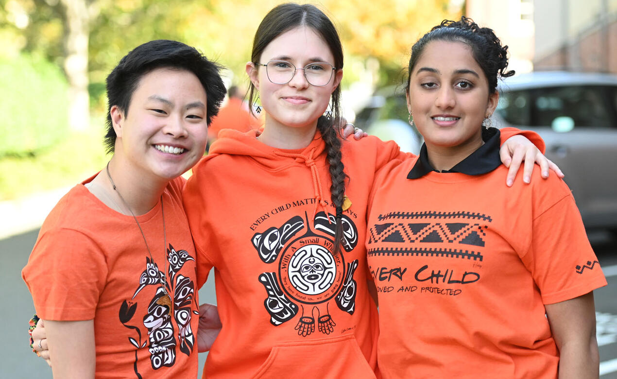 Senior School students stand in their orange shirts at our National Day for Truth and Reconciliation ceremony