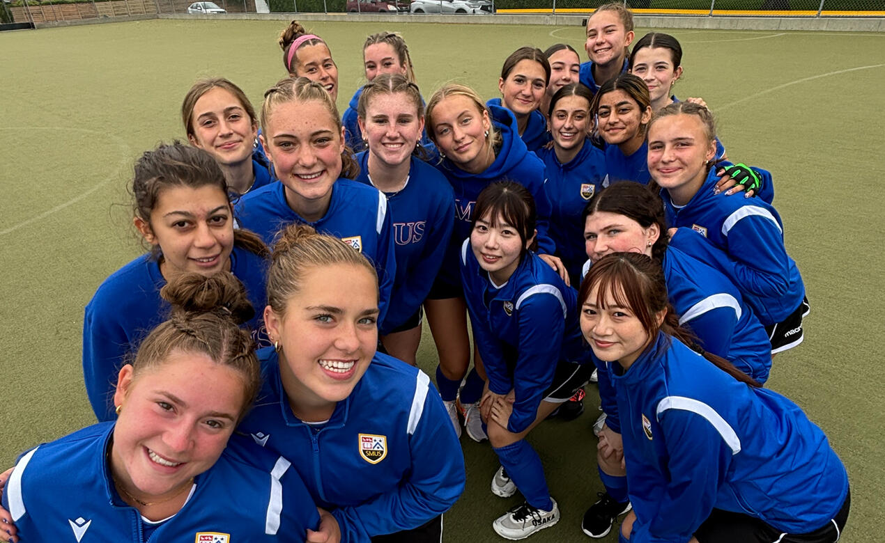 Players group together for a casual team photo