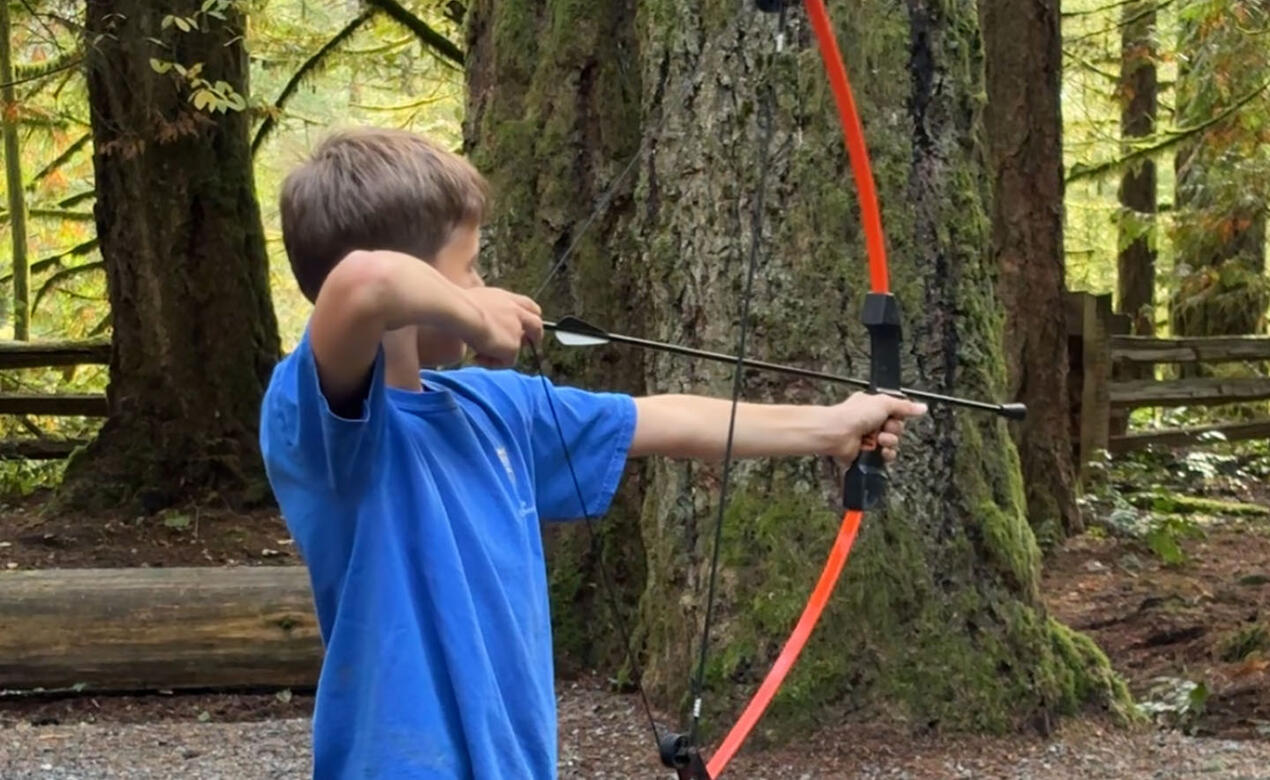 Grade 5 student practices archery