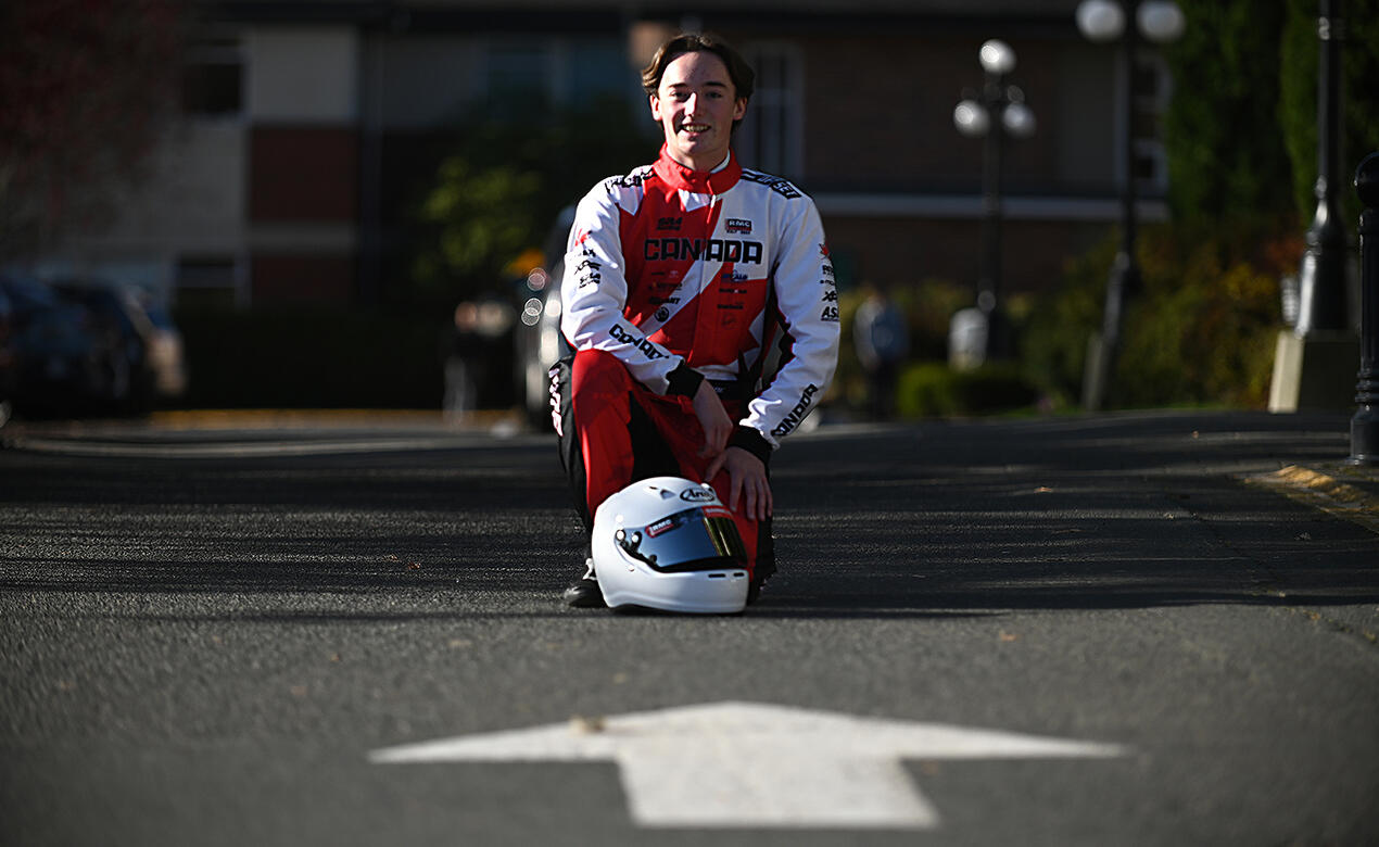 Pearce Wade poses in racing gear