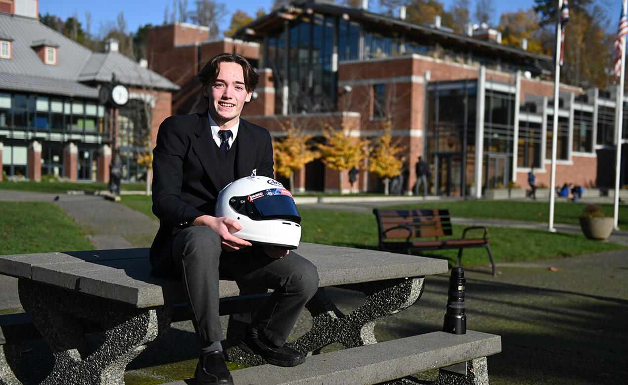 Pearce Wade poses with helmet outside the Sun Centre