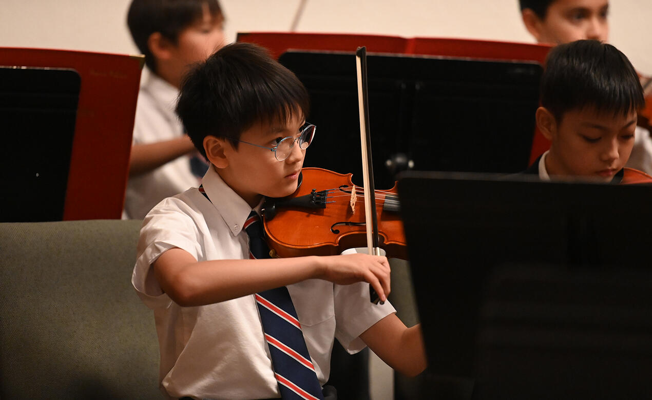 Middle School strings students perform