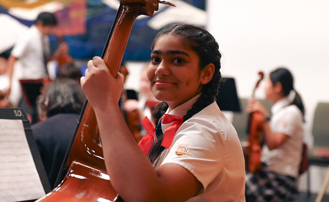 Middle School strings students perform