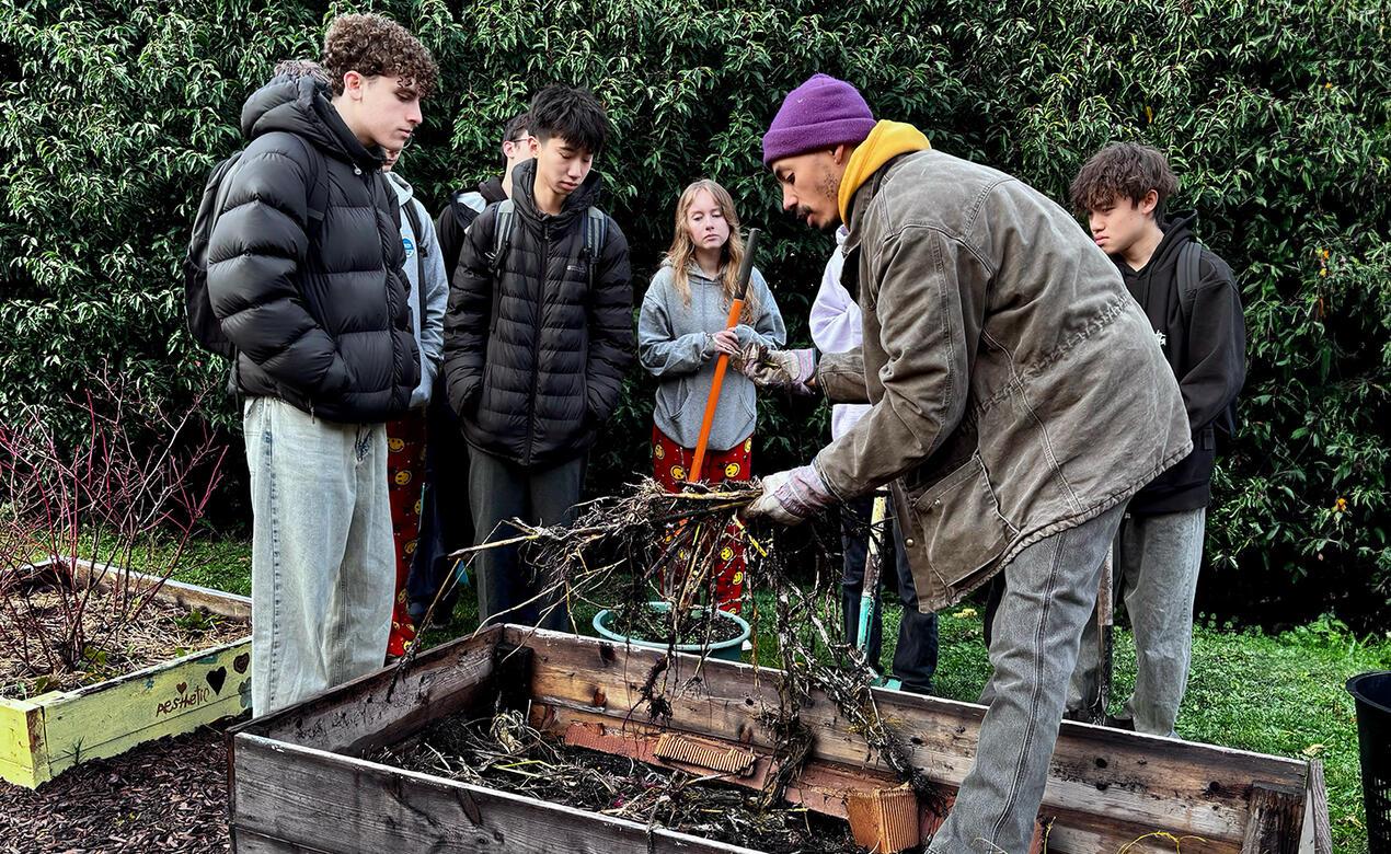 Grade 10 students learn about composting on Service Day
