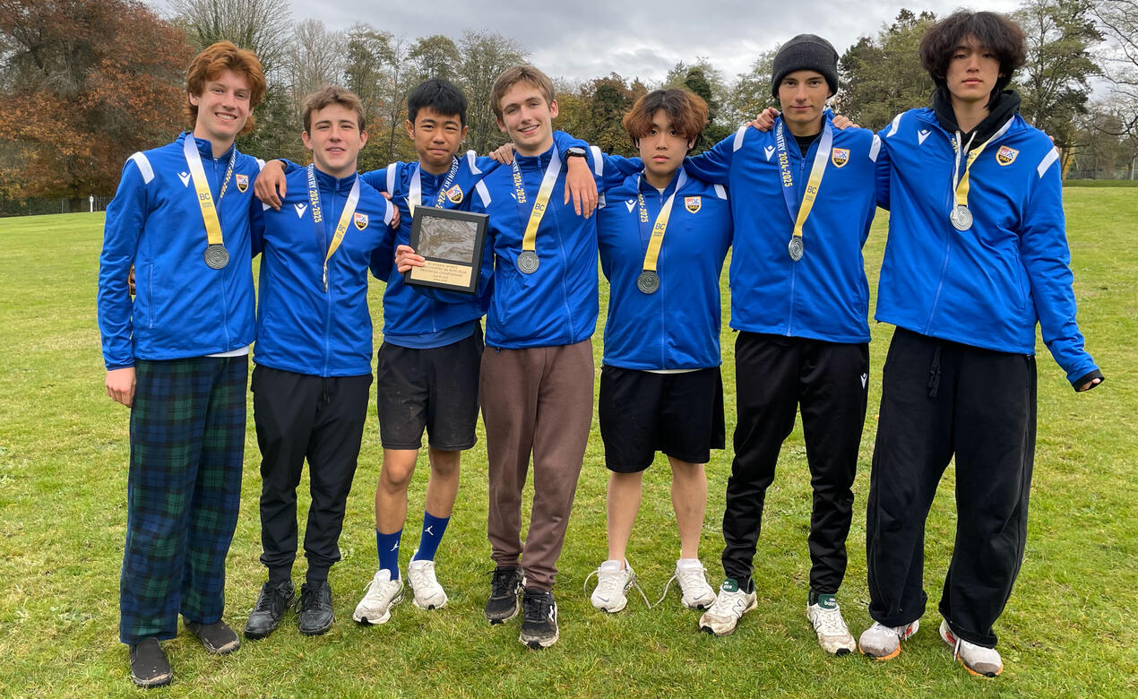The Boys cross country team with their medals from the BC Championships