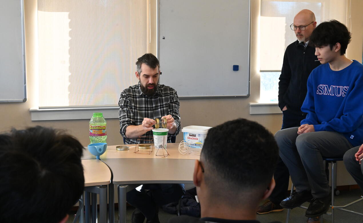 Dr. Trefor Bazett conducts a demonstration in math class.
