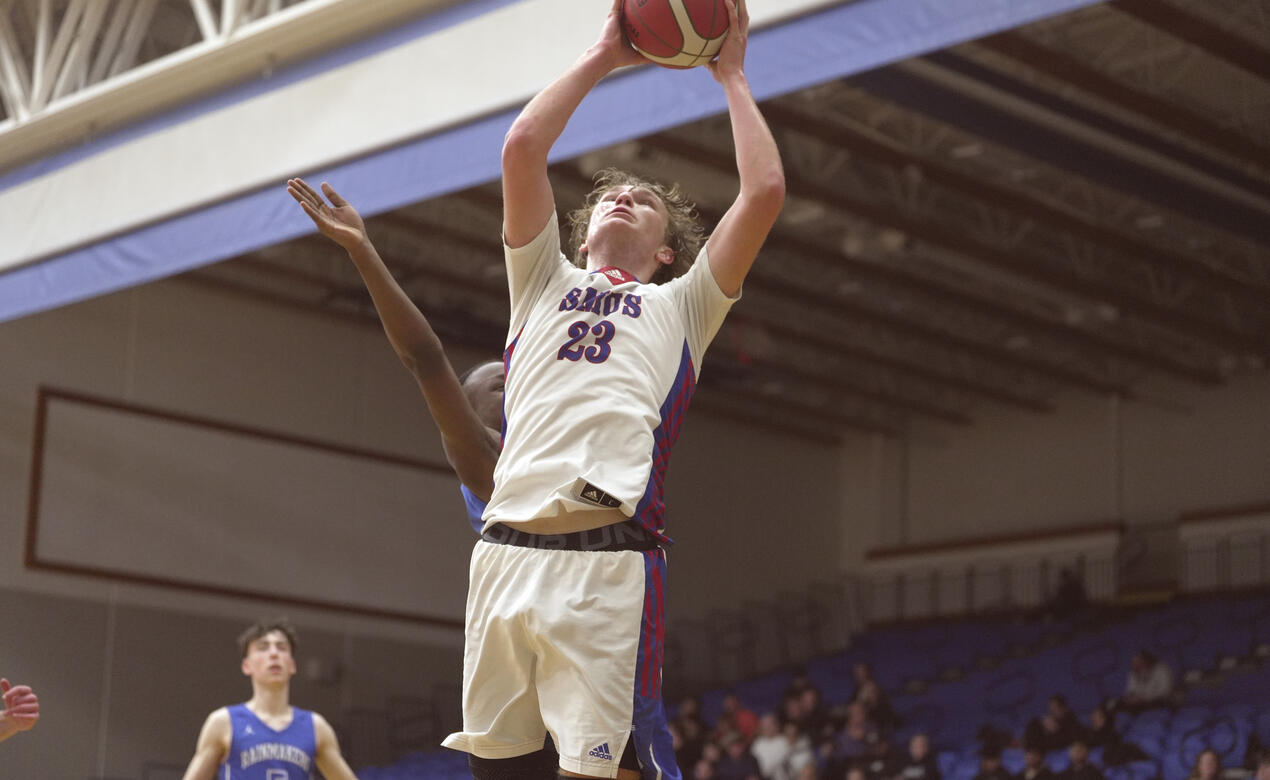 Action shot of the Senior Boys Basketball team at Provincials