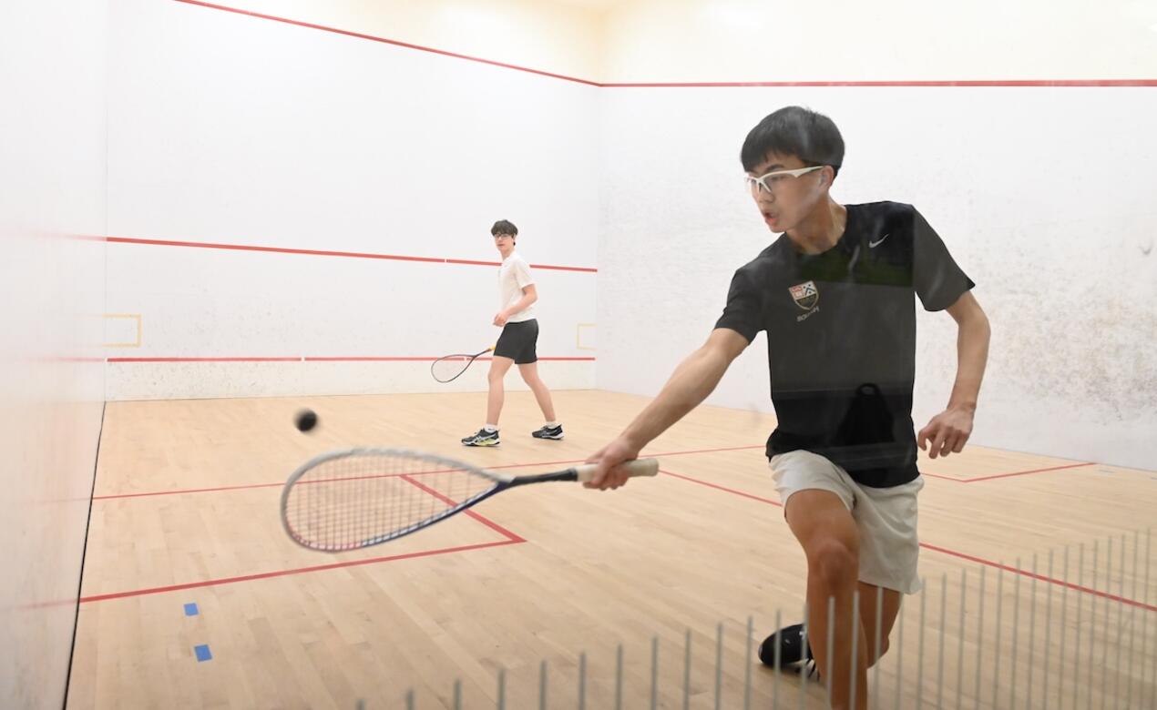 Senior Squash Action Photo