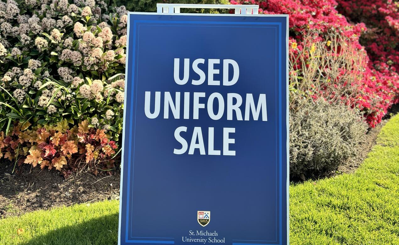 A used uniform sandwich board is on display on campus.