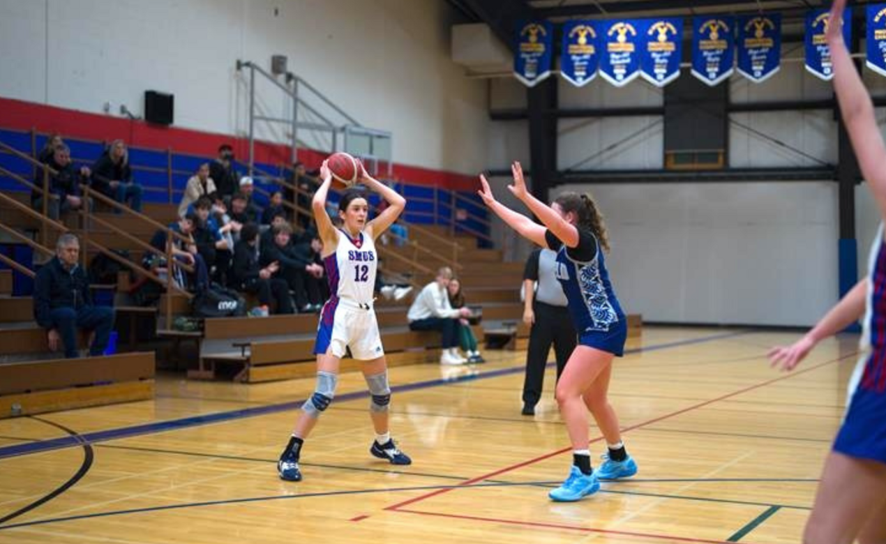 Olivia Pickering playing basketball