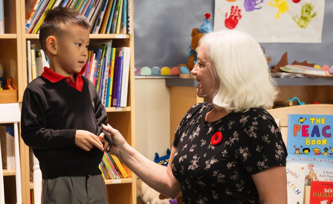 Kindergarten teacher Katie McNeil with a student