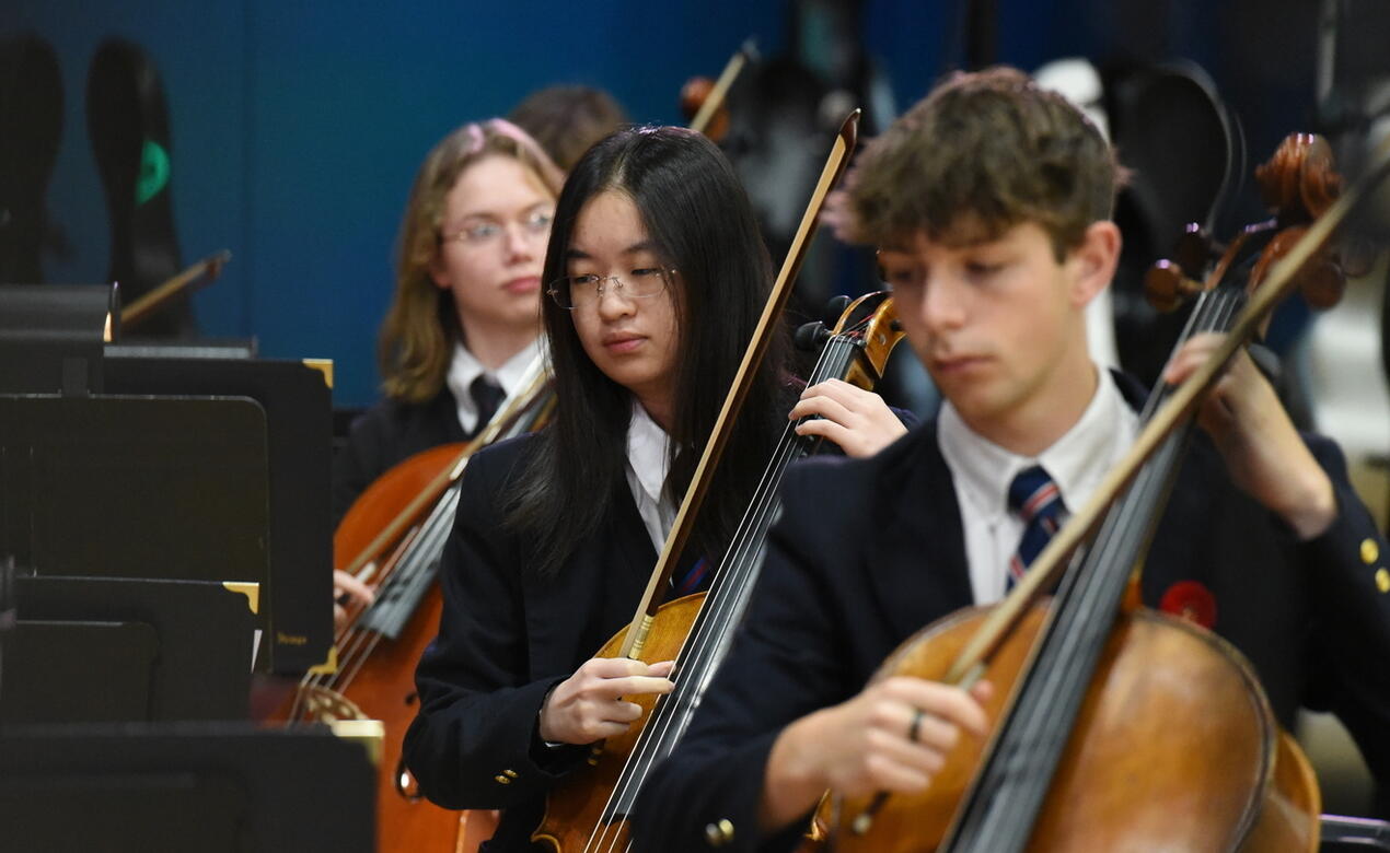 Alumni Sophia Yu '25 playing cello at SMUS