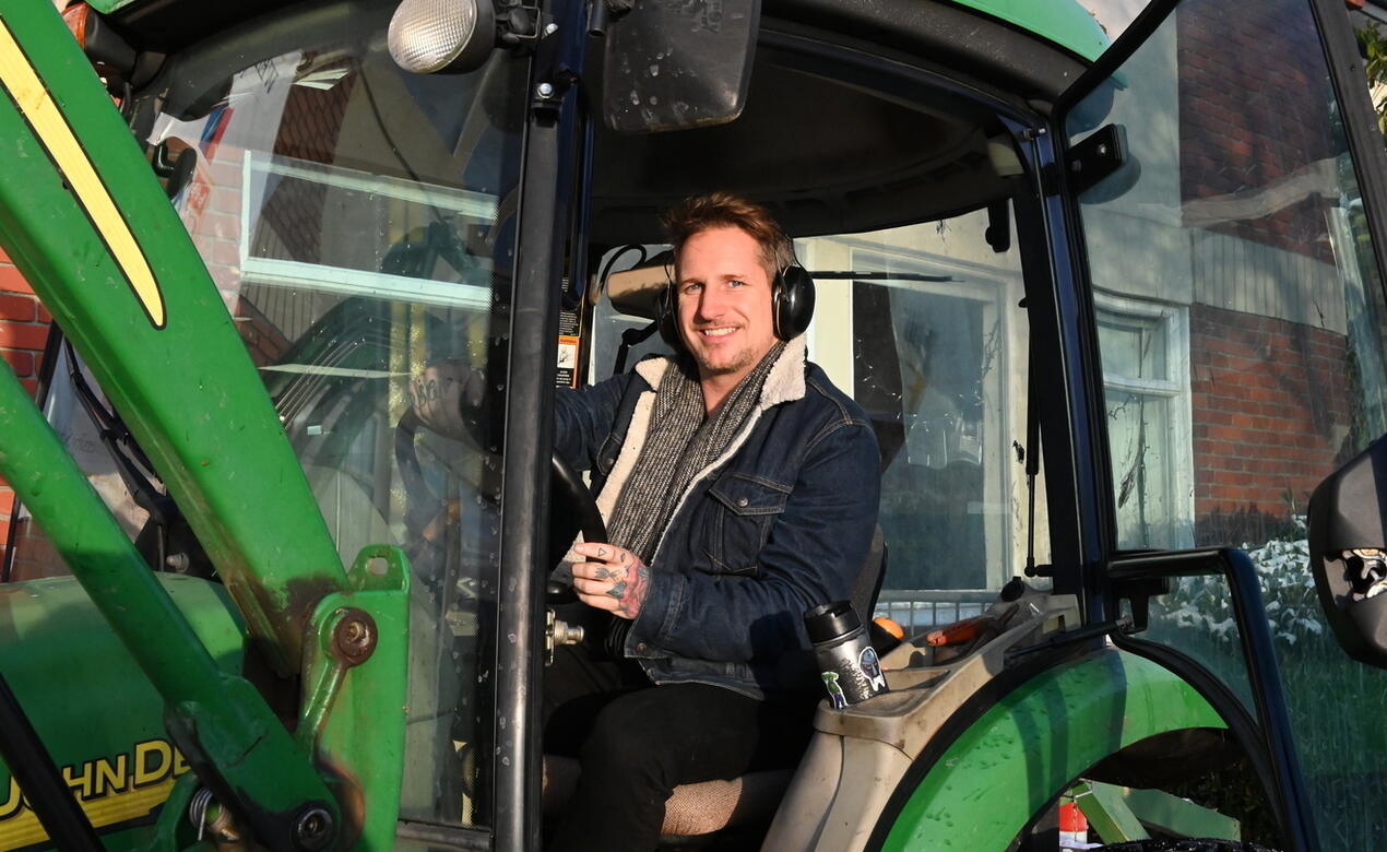 Groundskeeper Colin Craveiro on the tractor at SMUS