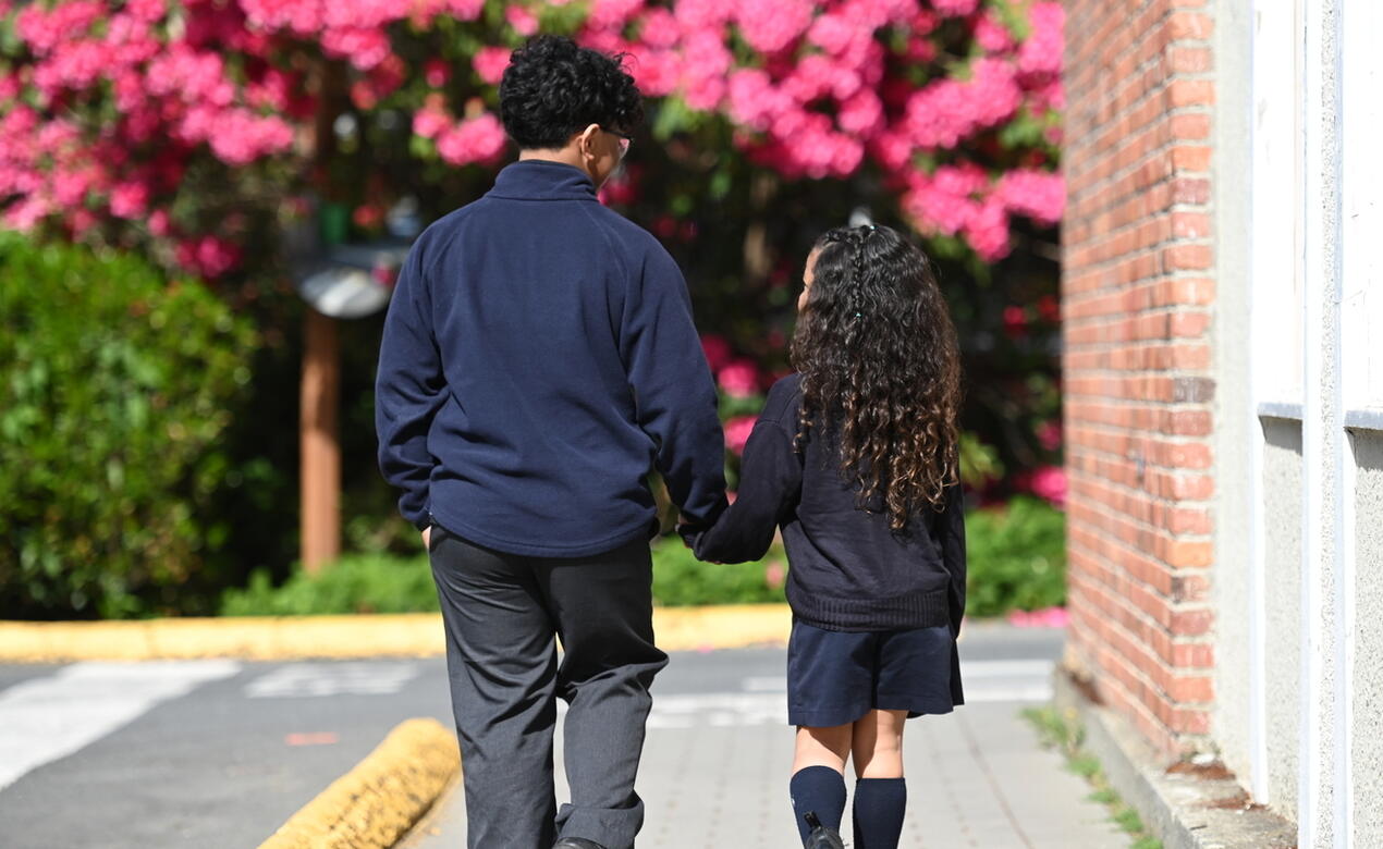 SMUS Siblings holding hands