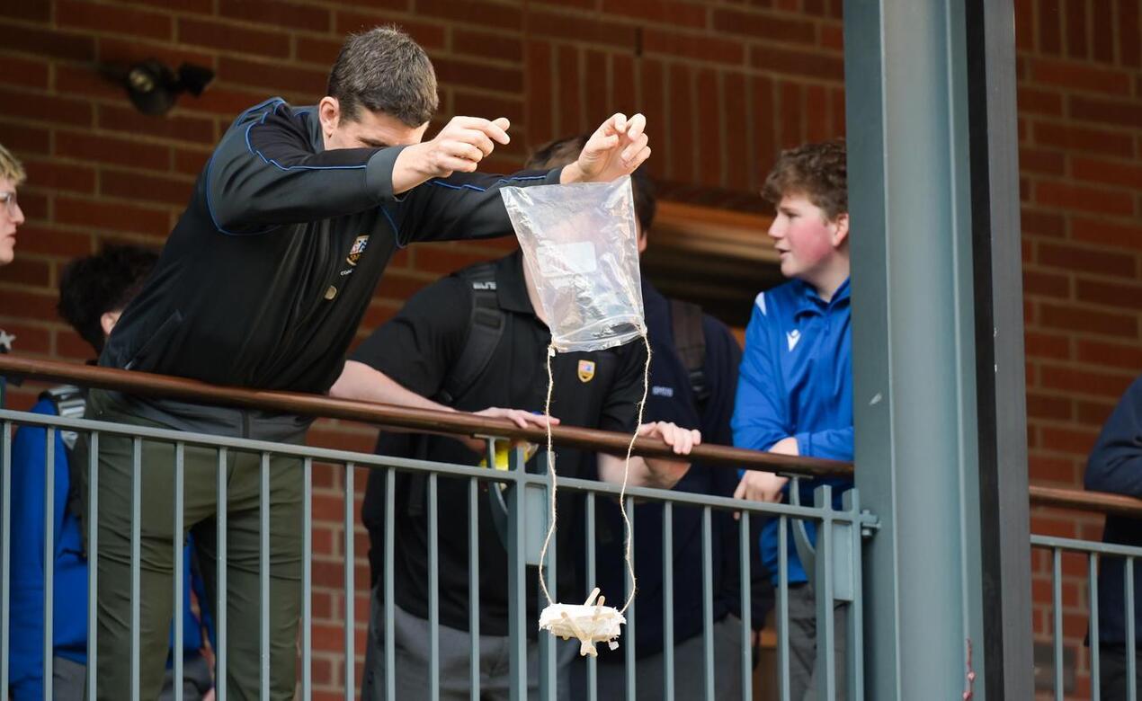 Student prototypes were dropped from the Crothall balcony in the annual Egg Drop Challenge