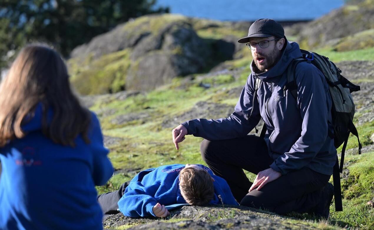 Outdoor Education teacher Jamie Pope instructs Grade 5s in first aid during an Outdoor Education class